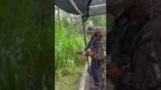 Alligator hunting with a 40 caliber handgun in the Louisiana Swamp. Ron and Jerry.