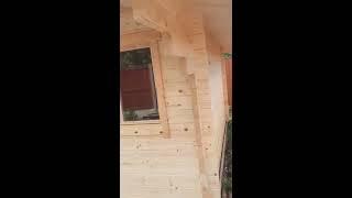 Краткий обзор садового домика с навесом из профилированного бруса