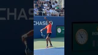 Giovanni Mpetshi Perricard warming up his   serve in practice 