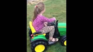 Ashley driving tractor