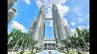 Kuala Lumpur, Malaysia : Petronas Twin Towers with bridge, modern architecture and capital city