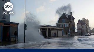 Giant waves crash over seawall, flooding street in western France