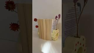 DIY bookends that hold your books AND your flowers 