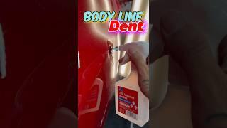 Dent repair on a body line using hot glue. #autobodyrepair #paintlessdentrepair #dentrepair #diy