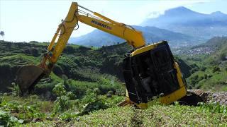 Mini Excavator Working On The Cliff Preparing Construction Site