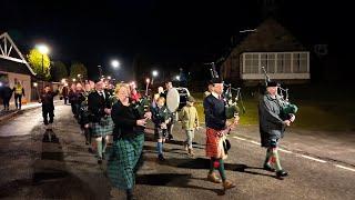 2025 Braemar Mountain Festival torchlight parade led by Pipes & Drums to Highland Centre