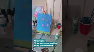 My daughter Elyn's watercolor painting flying pink flowers. 