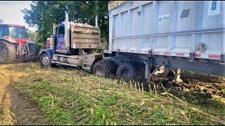 18 Wheeler stuck in the mud with floater tires. Corn Season never goes smoothly