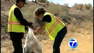 City picks up trash near apartment complex