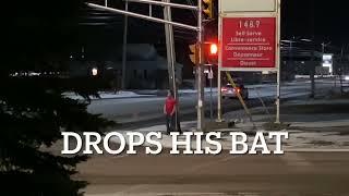 A Lunatic Across The Street Smashing Gas Pumps With A Baseball Bat Moncton NB Canada Christmas Night