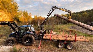 Henter tømmer i skogen med valtra traktor og Igland tømmervogn