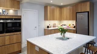 A Warm Oak Kitchen Case Study With Lots of Storage and Social Seating