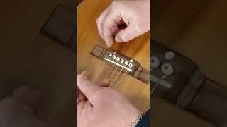 How To Fix Broken String : Acoustic Guitar String Replace