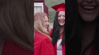 High School graduates walk the halls of their old elementary school one last time