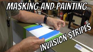 Masking and painting invasion stripes on my scale/non-scale Bird Dog look alike.