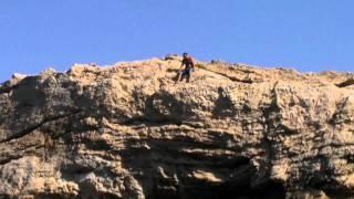 Simion jump from a 14m rock ,at Melani beach