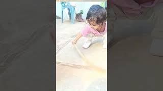 #small active pretty baby cleaning in tiles stones