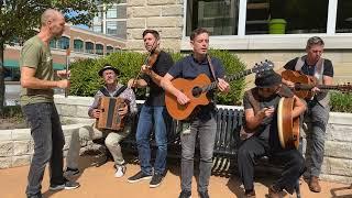 Dave Curley performs "A-Begging I Will Go" on Floyd's Bench along with Doolin and Colin Farrell