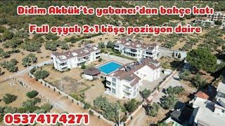 Didim Akbük'te yabancı'dan köşe pozisyon 2+1 full eşyalı bahçe katı daire havuz'lu otoparklı site'de