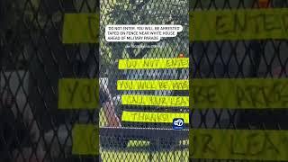'Do not enter, you will be arrested' taped on fence near White House ahead of military parade