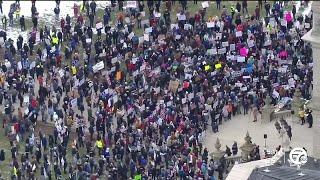 Anti-Trump protesters rally in Lansing