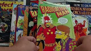 EP 785 A Stack Of Radioactive Man Comics from Bongo Comics, Simpsons Tie In Title.