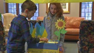 Maple East Elementary siblings raise hundreds for Ukraine