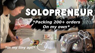 Packing 200+ orders on my own for my clothing brand at my tiny apt  life as a solopreneur vlog