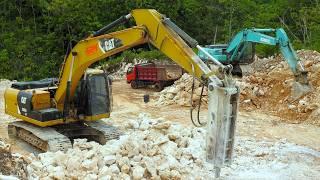 Excavator Dump Trucks Excavating Limestone Road Through The Hills