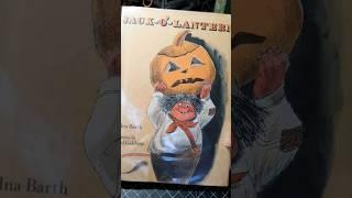 My book arrived that will be made into my Halloween Junk Journal!  Jack O Lantern