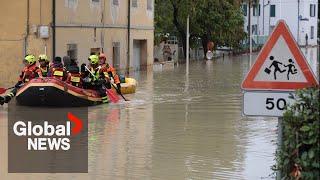 Italy flooding: "All hell breaking loose," resident says as extreme weather creates chaos