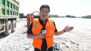 On-site: All-out efforts underway to repair breached dike at China's second-largest freshwater lake