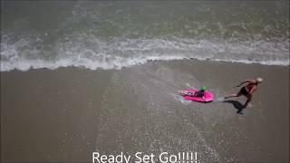 Janet Loper - -  Beach Cross Fit Training With Grandson Deklan on Boogie Board