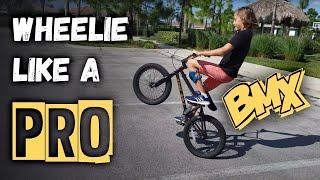 HOW TO WHEELIE ON BMX LIKE A PRO - TUTORIAL