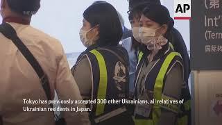 Japan FM flies 20 refugees from Ukraine to Tokyo