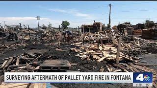 Aftermath of aggressive pallet yard fire in Fontana