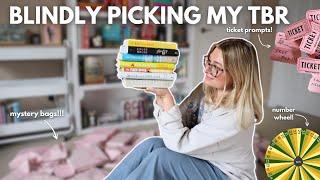 BLINDLY PICKING MY TBR|mystery bags, number wheel, and ticket prompts!