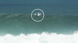 MEGA SWELL ULUWATU.  SURFER CAUGHT IN GIANT WAVE