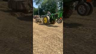 Dead weight pulling in Falmouth, Ky.  Mark Rath on a John Deere gas 3020.