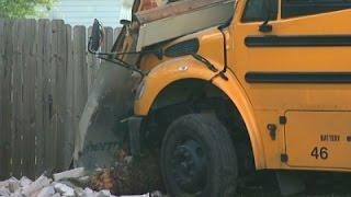 Raw: School Bus Crashes Into House in Houston