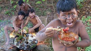 Primitive Wildlife - COOKING SNAIL. Eating Delicious