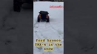 Ford bronco TRX-4 in the snow