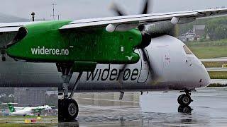 Widerøe Dash-8 400 rainy departure from Tromsø Airport