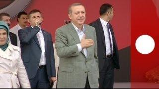 Turkish prime minister defiant at rally