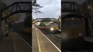 66722 Passes Sway Railway Station on Platform 1 heading to Eastleigh east yard.