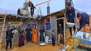 Zahra's family struggles to build a new home in heavy rain