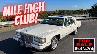 TRIPLE WHITE 1991 Cadillac Brougham D’Elegance For Sale by Specialty Motor Cars