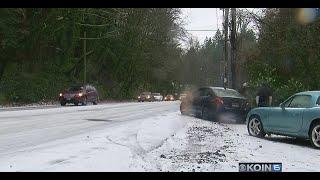 Snow, freezing rain continues in Portland metro on Christmas Eve