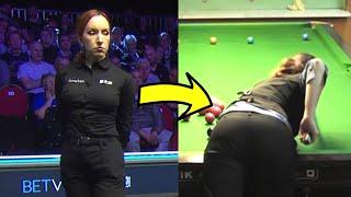 SNOOKER REFEREE SHOWS HER SKILLS ON SNOOKER TABLE