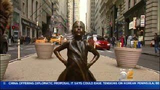 "Fearless Girl" Stands Up To Wall Street Charging Bull